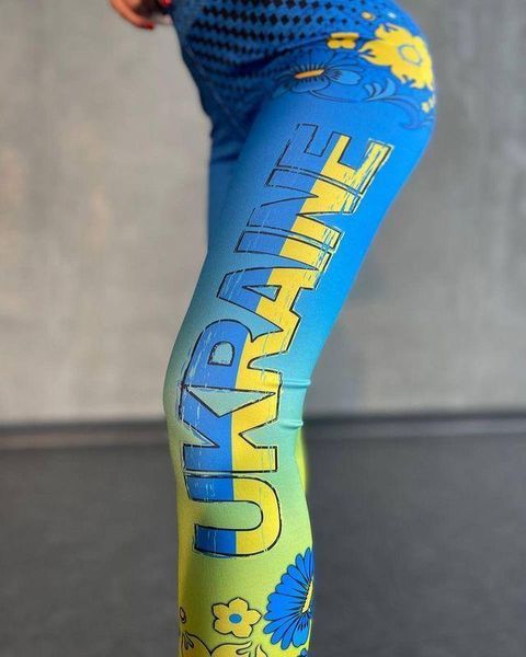 Жіночі лосини для спорту та фітнесу з широким поясом мікродайвінг колір блакитний з жовтим принт соняшник L 1816501 фото